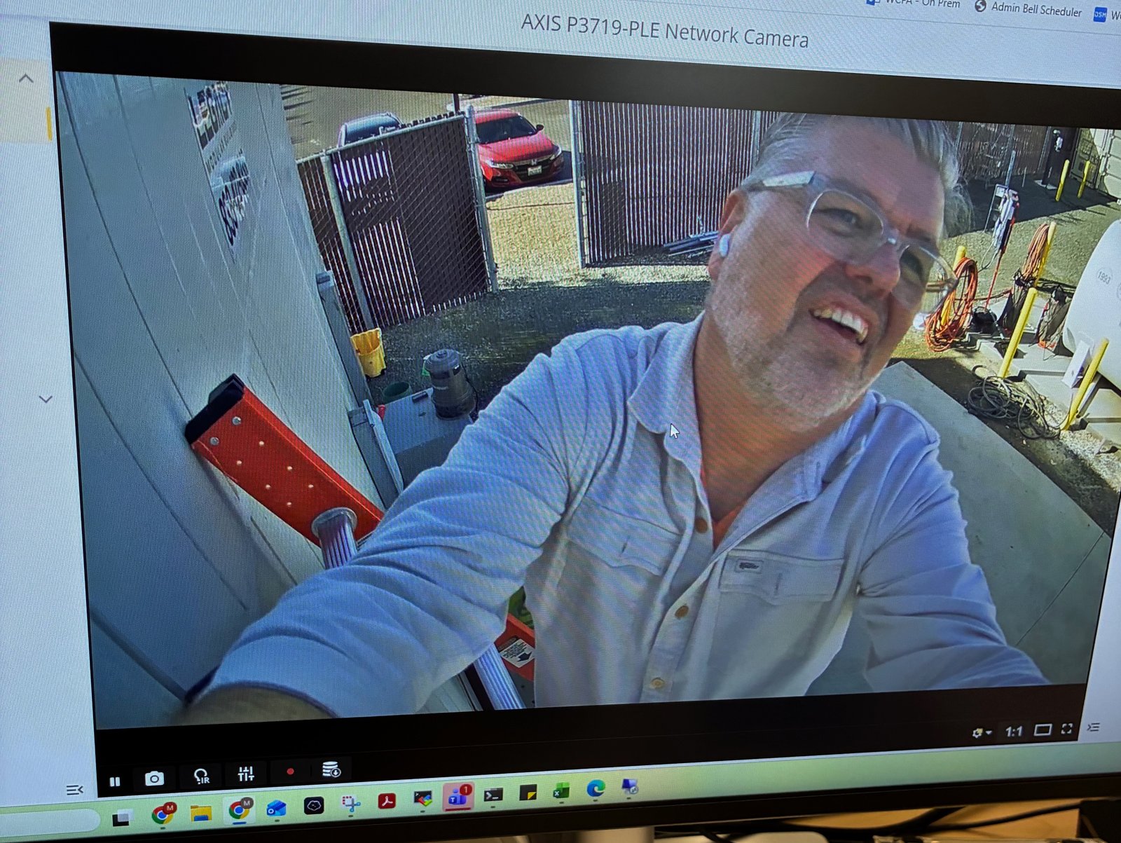 Ted Dronen testing an Axis fisheye camera at a client job site
